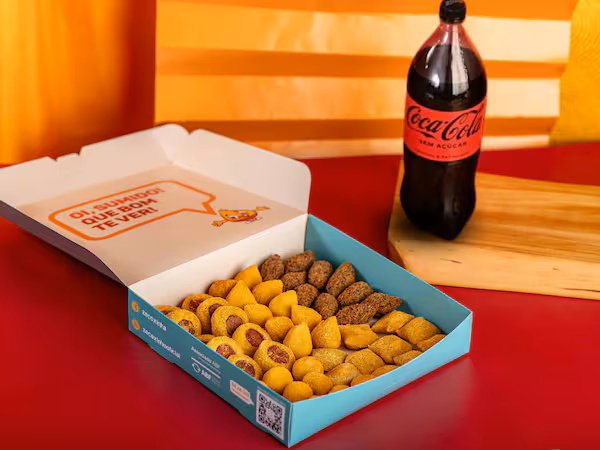 100 Salgadinhos + Coca-Cola Grande